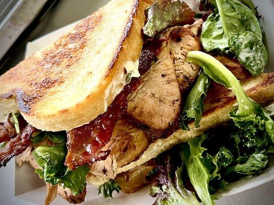 Turkey club sandwich with house smoked Turkey breast