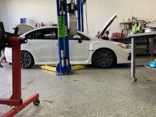 Engine work and Tein Coil Overs installed.
 Very clean shop!