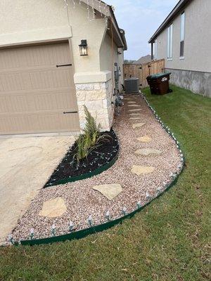 New house needed a walkway for trash cans with lights for Christmas time!