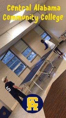 Students playing ping pong at CACC.