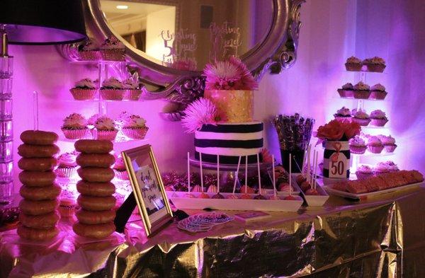 50th  Birthday display! Beautiful cake,decorated donuts, delicious cake pops. Set up was perfect!