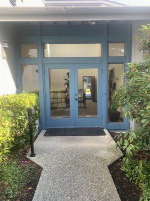 The main entrance into the building with the clinic just to the left past those doors.