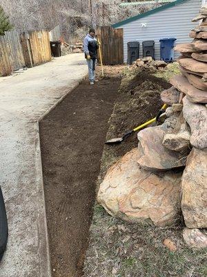 Digging some dirt out so we can extend drive way