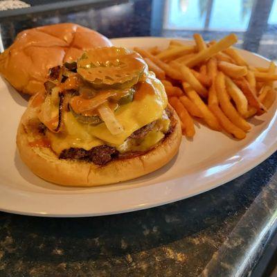 The OG Smashburger fried onions, American cheese, pickles with special sauce.