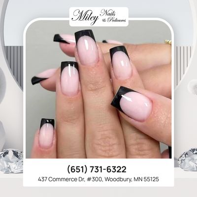 Elegant and stylish black-tipped nail design at Miley Nails & Pedicures 
   !