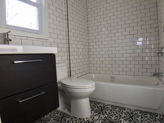 black grout, subway tile bathroom, modern bathroom vintage