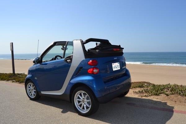 A nice day with the SmartCar on the beach.