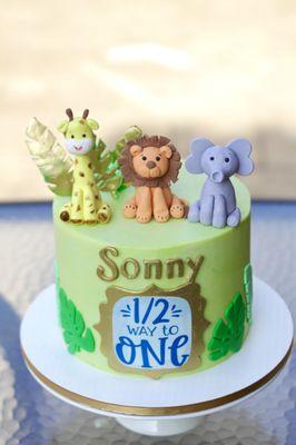 Safari themed cake with edible fondant figurines