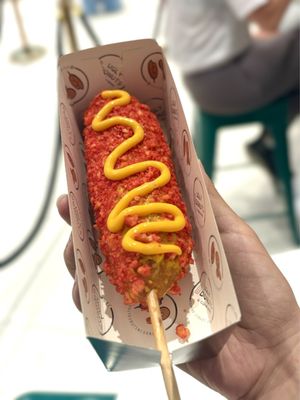 Hot Cheetos Ugdog with Cheddar Cheese.