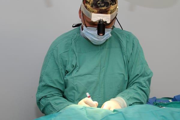 Dr. Clayton Simon doing surgery