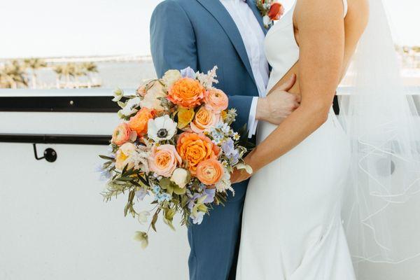 This bridal bouquet was a work of art. I couldn't love these photos more because of all the colors from the flowers!