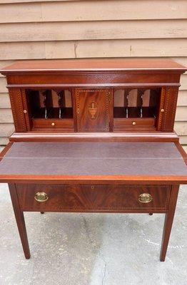 1940's writing desk with new leather surface.