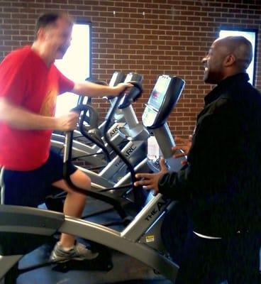 Personal trainer James Lewis with client.