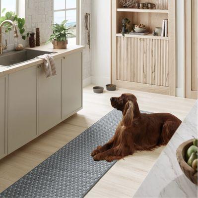 Embrace the timeless beauty and natural warmth of this white oak hardwood flooring in your kitchen.