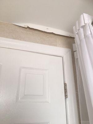 Peeling ceiling in bathroom