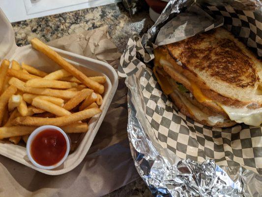 Grillo cheese burger and fries