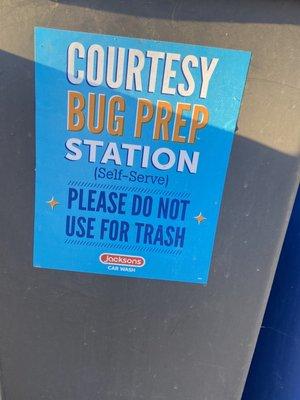 Brush, freshwater, and soap provided to scrub some dirt/bugs away before entering the car wash.