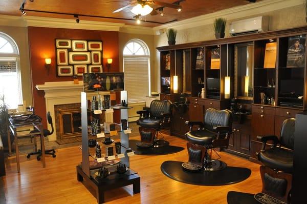 Another view of our men's barbering area. Complete with a LCD TV at each station.