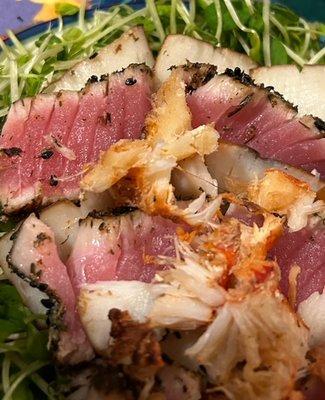 Smoked lobster bits top layers of sliced smoked scallop and seareda ahi tuna. So many tasty ideas come to mind ...