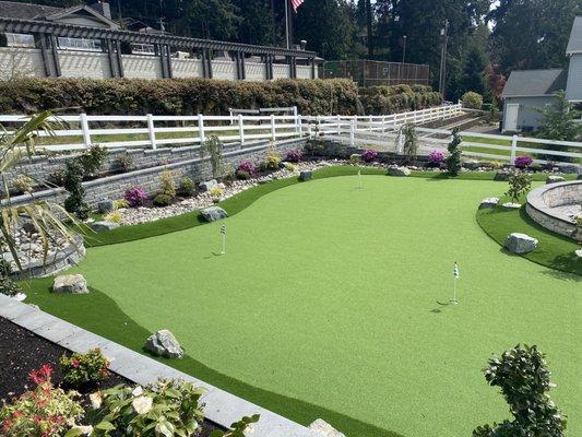 Putting green installation, retaining wall, design