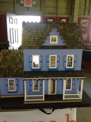 Blue house with room addition