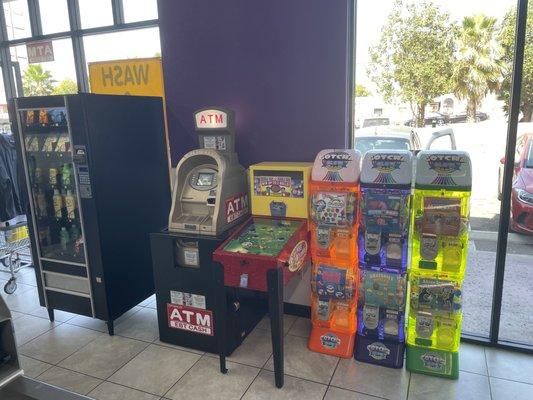 Vending options include an ATM, a pinball game, and toys for kids!