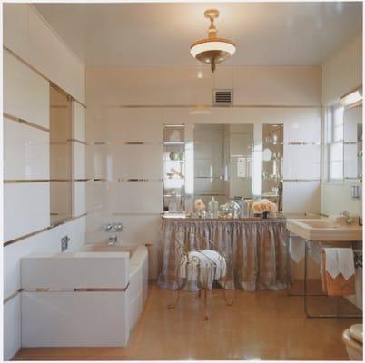 residential renovation peach glass and peach mirror bathroom