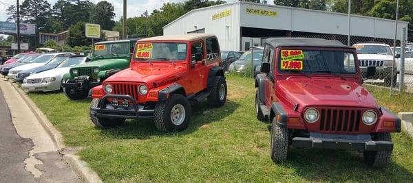 Showcase Cars on front lawn 6258 Clinton Highway.