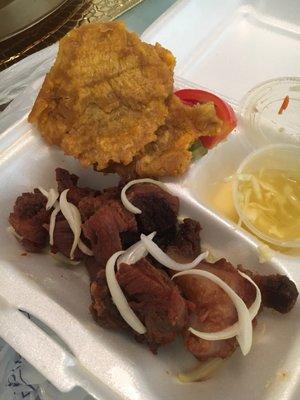 Already started eating, but this is some of their Griot, banan, and pikliz! So delicious