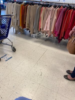 Color coordinated donated clothing --- well organized