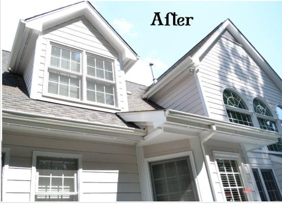 Pressure washing is a safe, low pressure wash. It includes scrubbing the exterior of all gutters to remove the black mildew.