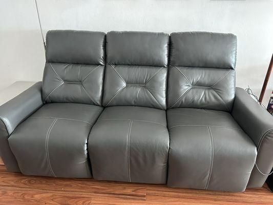 Couch with electric recliner