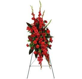 An all red/crimson spray on easel is an elegant statement that conveys sympathy and remembrance.