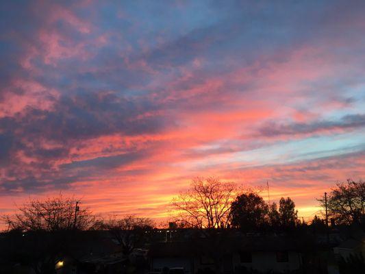 Sunrise from my porch! Before the rain.