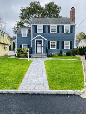 After planting new bushes and reseeding lawn (grass came in lush and the most beautiful color after about 3-4 weeks, maybe less)