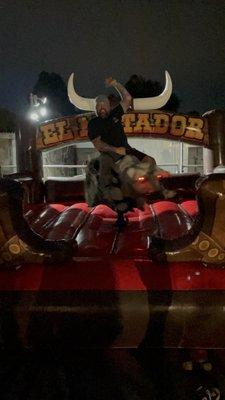 My husband enjoying a bull ride after a few tequila shots for his 50th!