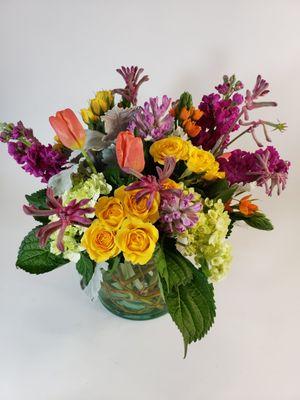 A bright mix of colors using some tulips and kangaroo paw.