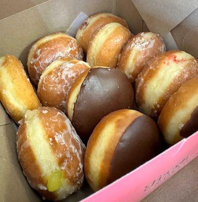 My box of donuts to go, look how puffy and round they are.