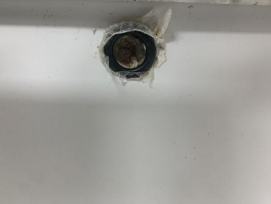 Rigged overflow drain on sink.