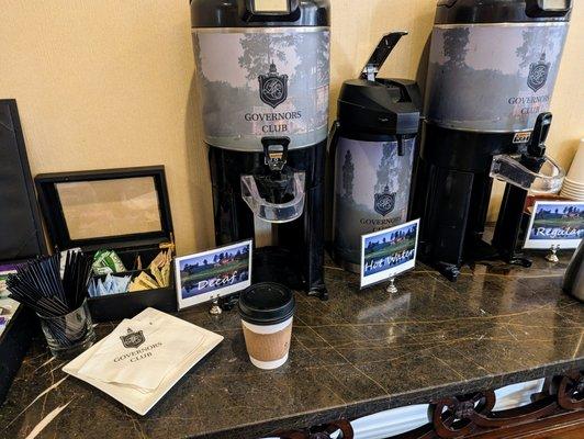 Inside the clubhouse lobby, getting some coffee.