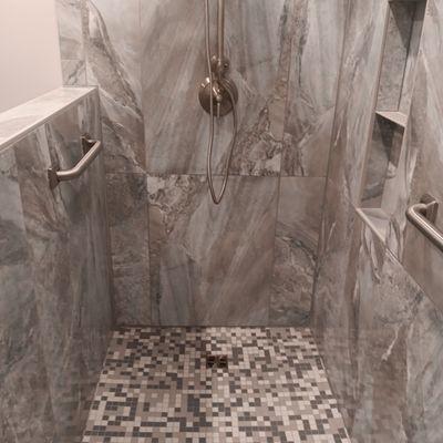 Residential Bath Remodel: Schluter Sytems, large format porcelain tiles (2'x4'), framing, plumbing, electrical, drywall, and painting