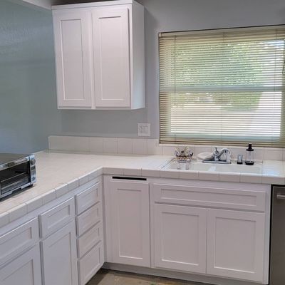 Kitchen makeover. Nee doors and drawer fronts. Customer painted the cabinet boxes themselves