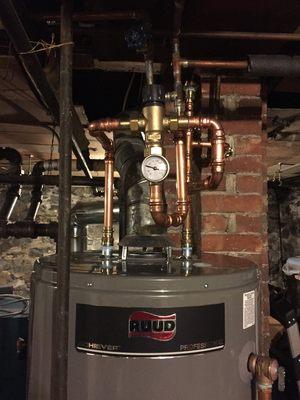 Tank type gas water heater with mixing valve and temperature gauge installed in Marina Del Rey, CA