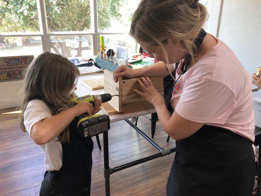 Power Tools are for girls. These two are making an Owl Box .