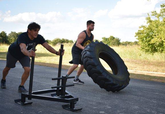 We have a wonderful outdoor area for tire flipping, sled pushing, or group training.