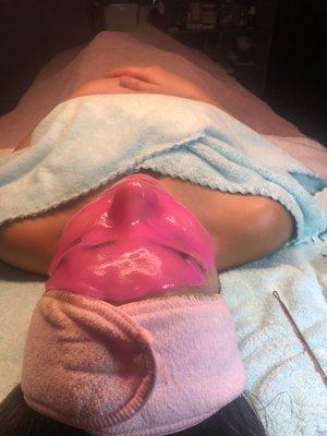 Teen facial . Targeting hyperpigmentation with this pretty in pink spot diminishing jelly mask.