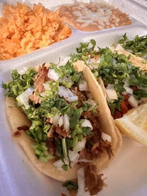 3 tacos with carnitas, al pastor, and asada. Rice and beans.