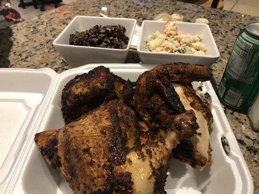 Whole chicken with a side of black beans and rice and pasta salad. Delicious!!