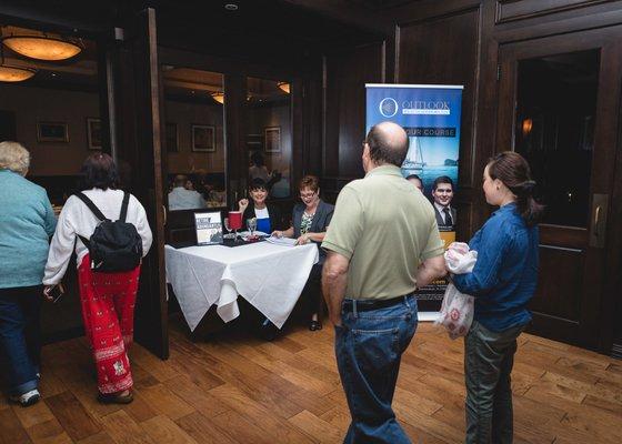 Guests arriving at one of our monthly educational workshops on retirement planning.