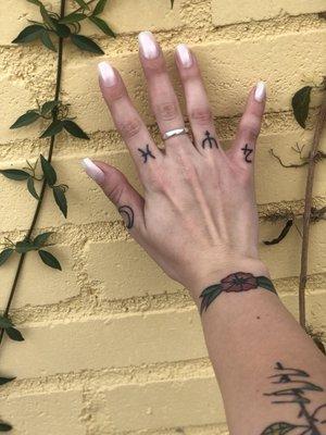 My lil finger tattoos by Jon